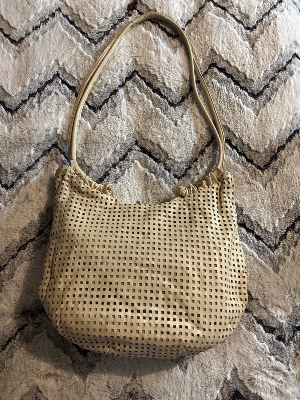 Perforated Shoulder Hobo Bag in Cream
